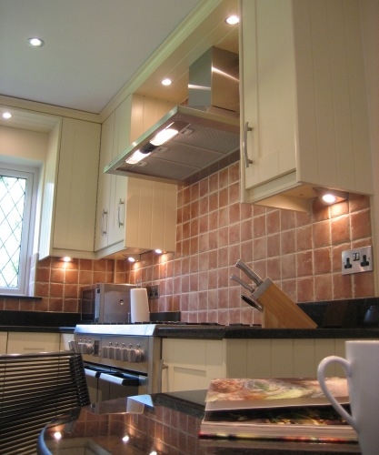 Classic Shaker painted cream cabinets with black granite worktops - Complete replacement kitchen for Mr & Mrs Foster, Wokingham