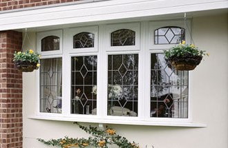 4 Section leaded bow window with dummy arches