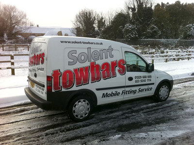 Vehicle signs and graphics. Digital printing and cut vinyl lettering.