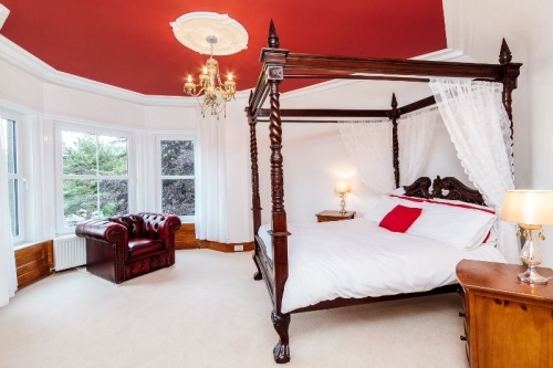 Red Four Poster Room