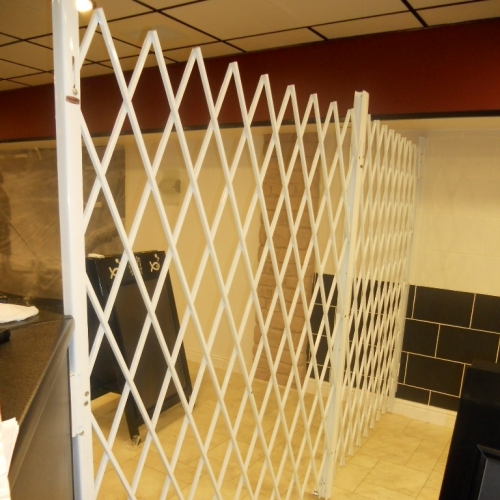 QSec Trackless Barrier System (installed at a fish bar in Manchester)