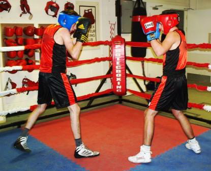 COMPETING BOXERS: Training